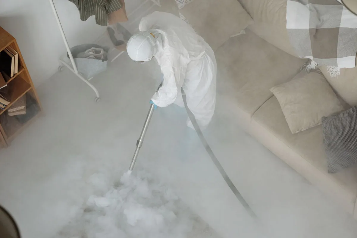 Biohazard cleanup technician in protective equipment, Diablo, CA